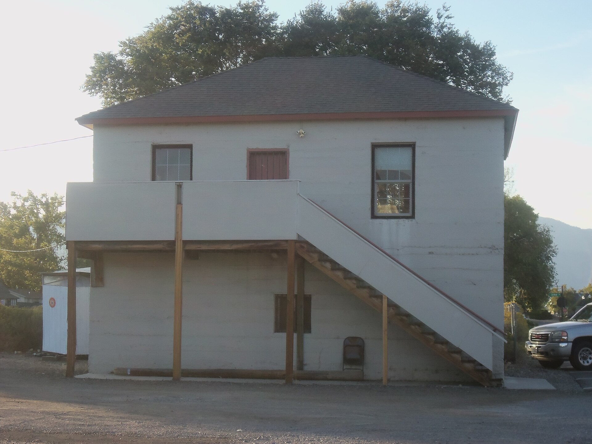 The two-story concrete Gardnerville Branch Jail, with the outside stair to the former courtroom